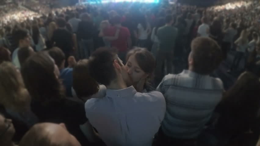 Image result for kissing in crowd