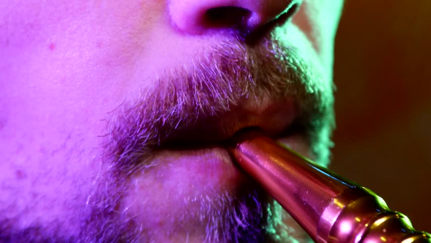 Closeup Of Man With A Beard Smoking Traditional Hookah Pipe Man