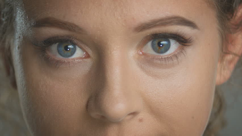 Beautiful Girls Face With Big Eyes Close Up Stock Footage