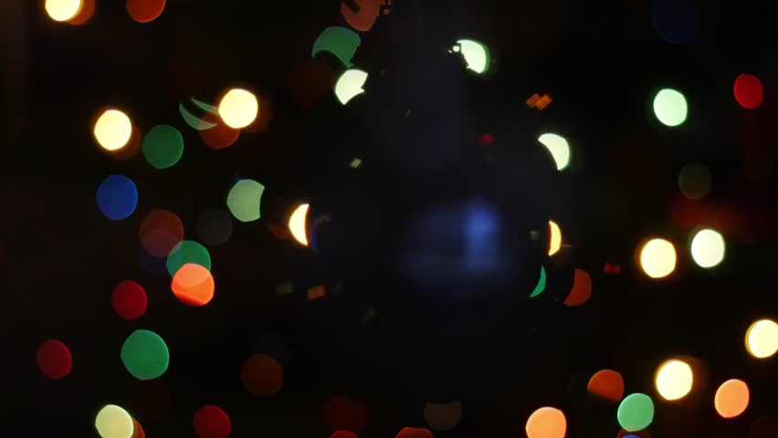 blurred colorful christmas lights on black background with blurred colorful christmas lights on black background with