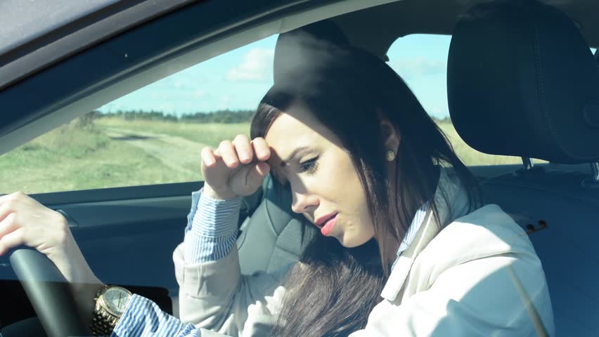 Winter Driving Woman Is Driving A Car On A Beautiful