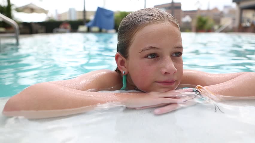 Pre Teen Girl Playing In The Pool Stock Footage Video