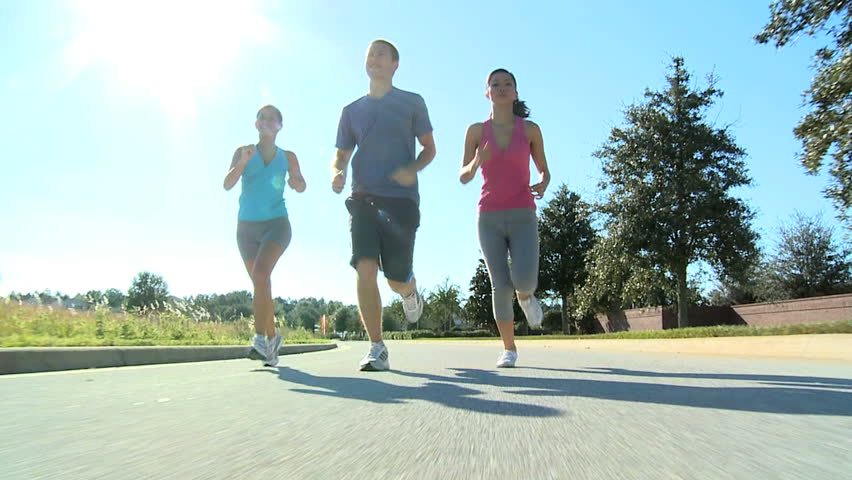 Three fit young people keeping fit jogging together - HD stock video ...