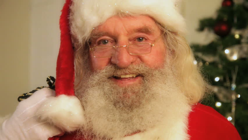 closeup portrait of santa claus smiling and waving stock closeup portrait of santa claus smiling and waving stock