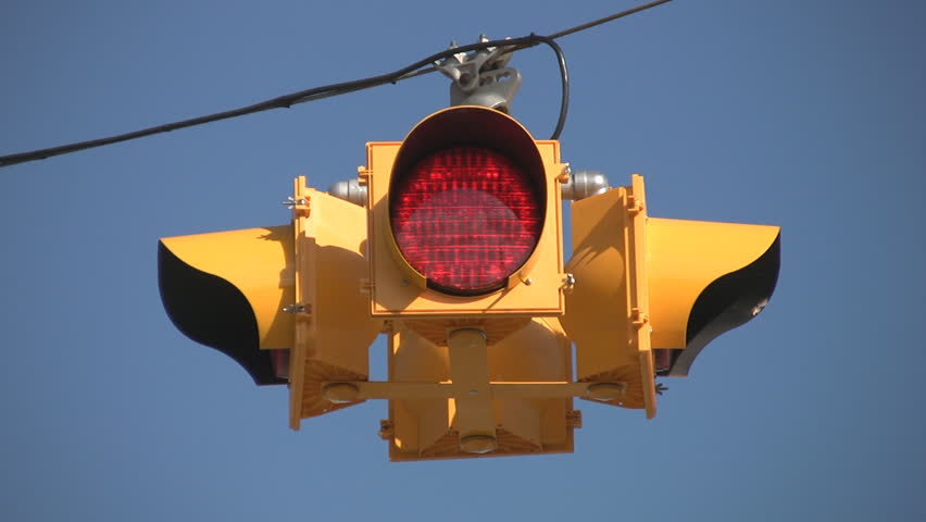 flashing-4-way-stoplight-blue-sky-background-stock-footage-video