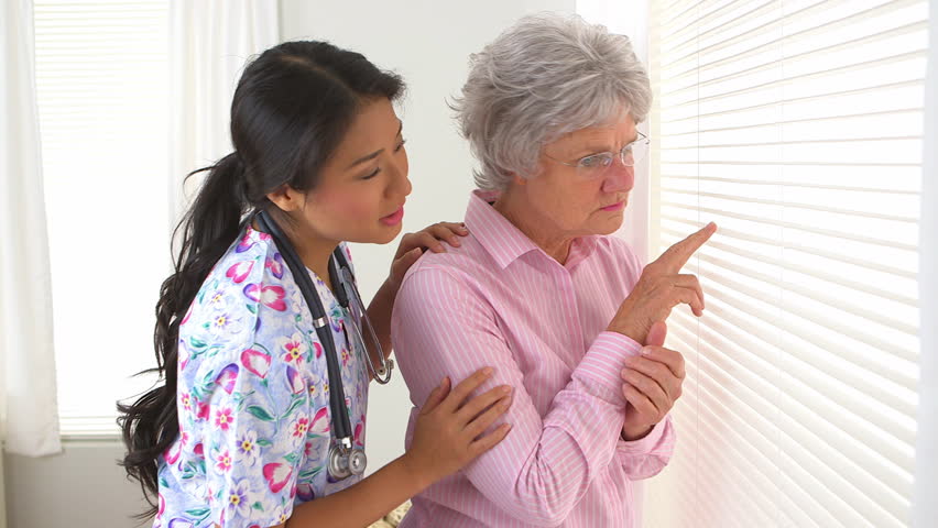Japanese Caregiver Consoling Her Patient 動画素材 4265816 Shutterstock