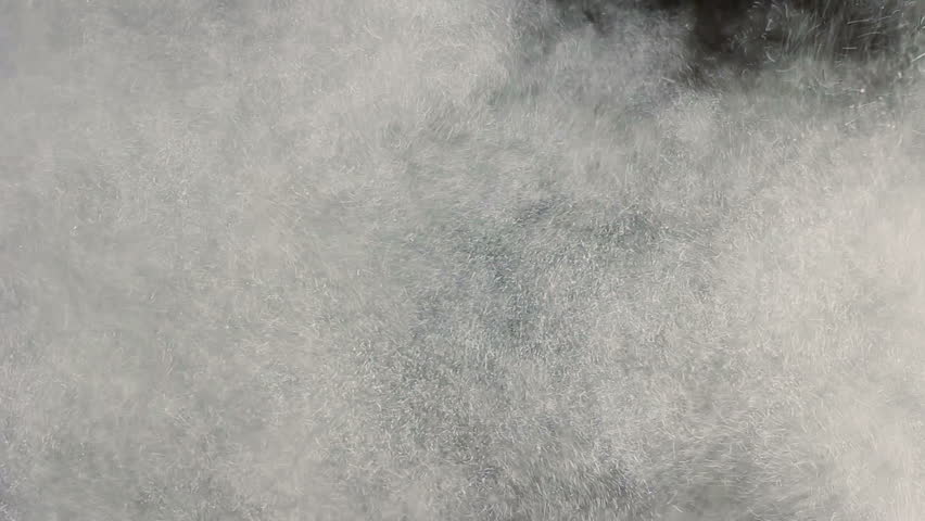 Close Up Of A Dust Explosion Against Black Background Stock Footage