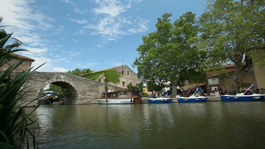 LE SOMAIL, FRANCE JUNE 22 Barges Passing Bridge On June 22, 2013 In