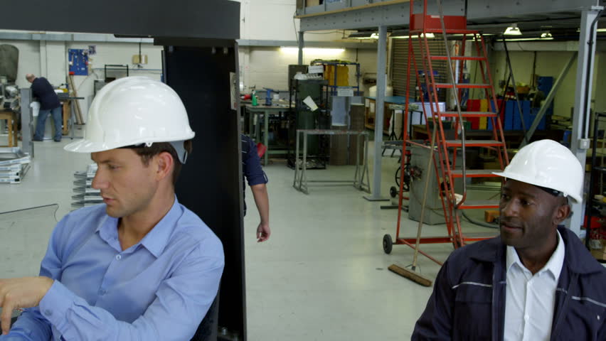 engineer talking to the forklift operator automotive engineer on quality control duty in a car manufacturer - Duties Of A Forklift Operator engineer talking to the forklift operator automotive engineer on quality control duty in a car manufacturer - Duties Of A Forklift Operator