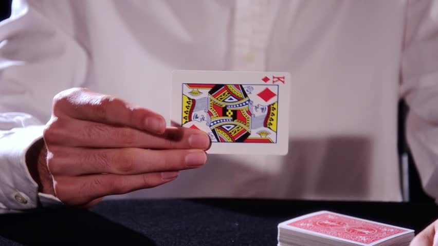 Poker fly magic trick