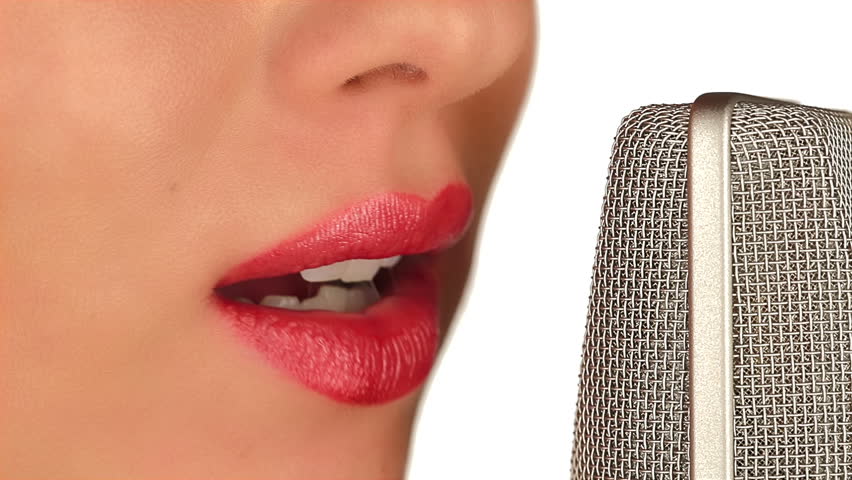 Close Up Of A Young Woman Mouth Talking Into A Microphone Stock Footage Video 5780156 Shutterstock