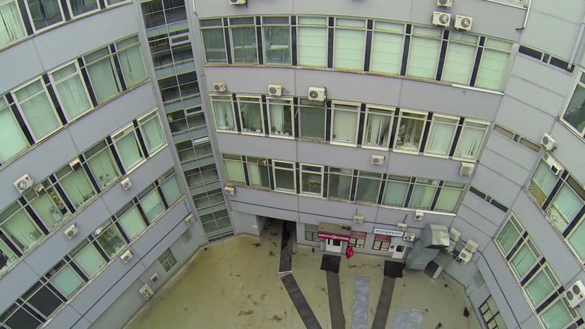 Inner Yard Of Pentagon Shaped Building With Windows Of Offices Stock