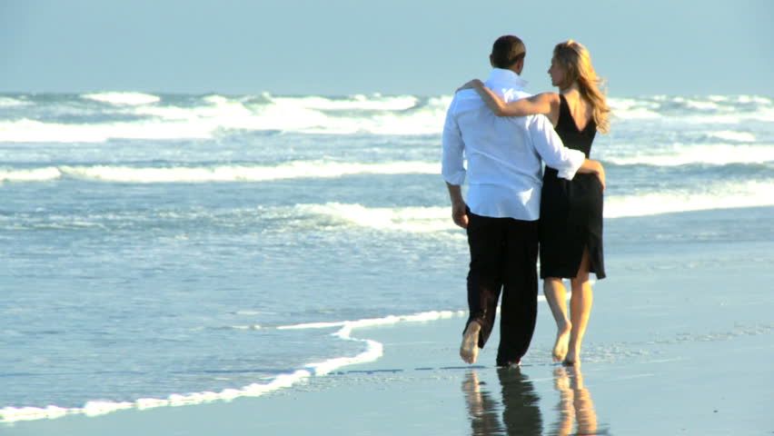 Two Young People In Love Walking On The Beach Early Morning After A Social Night Out 60 Fps