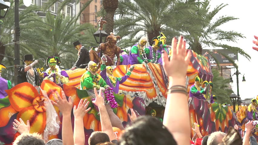 mardi gras throwing beads meaning