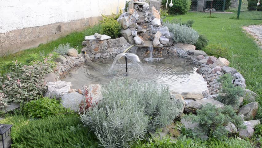 Backyard Fountain Stock Footage Video - Shutterstock