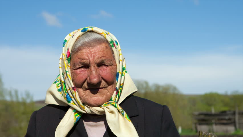 Portrait Of Mature Woman With Green Eyes And Scarf On Head Stock Footage Video 6190259 
