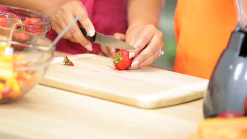 Kitchen Counter Close Up close up of kids' hands making colorful cookies stock footage Kitchen Counter Close Up close up of kids' hands making colorful cookies stock footage