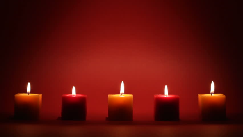 Candles In A Row On Red Dark Background Stock Footage Video 6533033