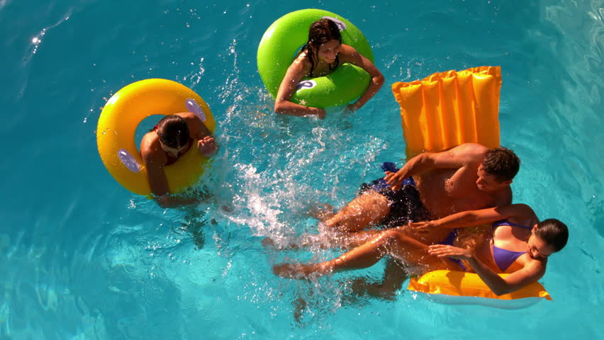 Smiling Brunette In Yellow Bikini Swimming Underwater In