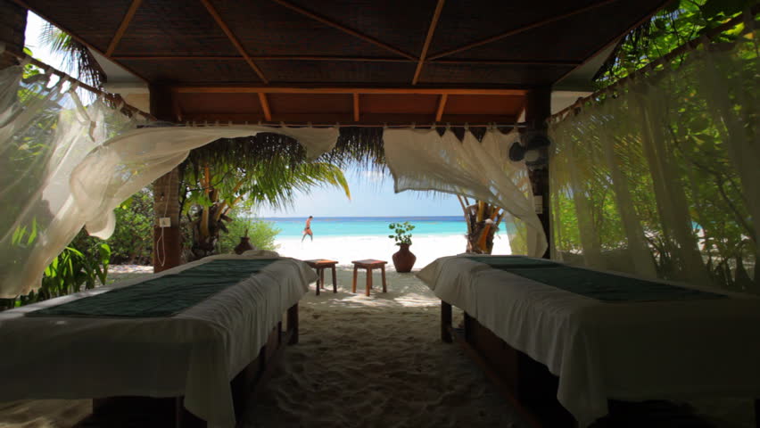 Two Massage Tables In Outdoor Spa On Tropical Beach Stock Footage Video