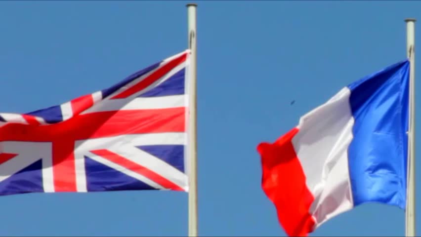 Flags Of Great Britain, France, Russia On Blue Sky Background Stock