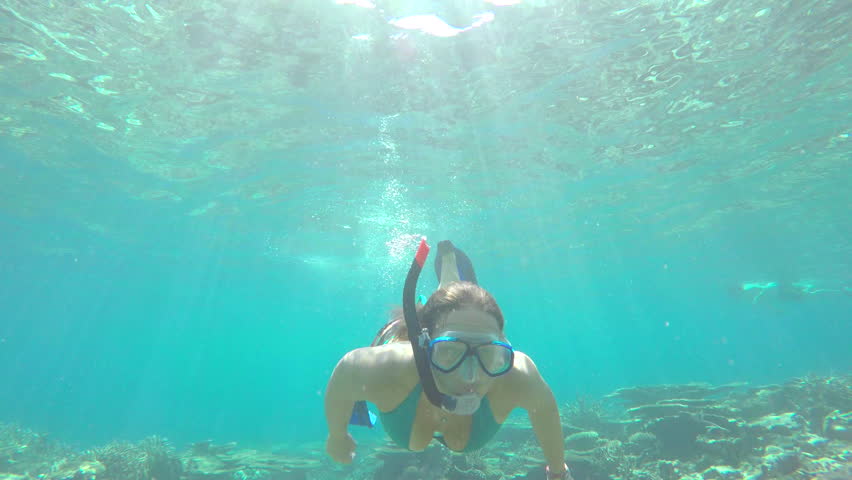 UNDERWATER Young Woman Snorkeling In Indian Ocean Reef Stock Footage