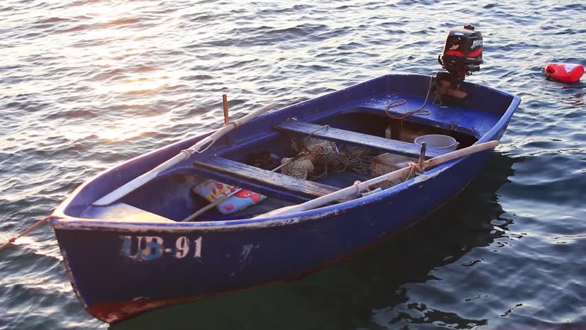 small fishing boats small fishing boat floating on the water stock footage small fishing boats small fishing boat floating on the water stock footage