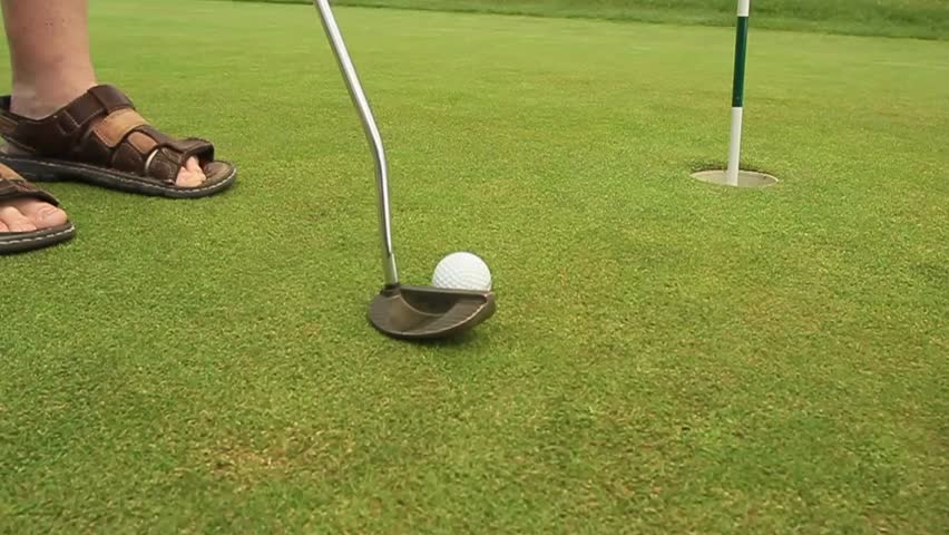 Golf Ball Going Into The Hole Stock Footage Video 227887 - Shutterstock