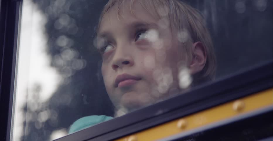 Sad Child In School Bus Window Stock Footage Video 11233445 - Shutterstock