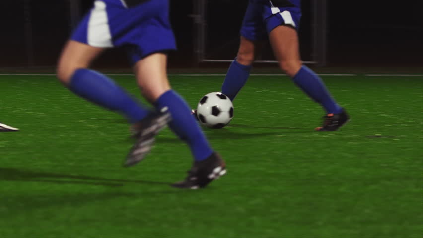 Young Soccer Player Demonstrates Footwork By Dribbling Ball Stock ...