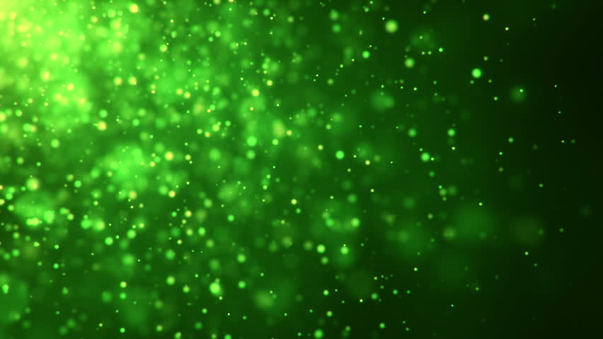 Sparkly Gold And Silver Light Particles Moving Across A Green Gradient ...