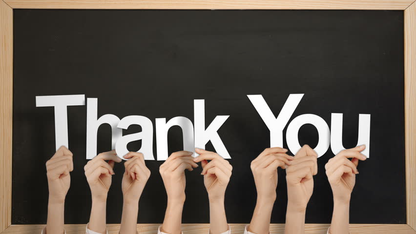 Hands Holding Up Thank You Against Chalkboard Stock Footage Video ...