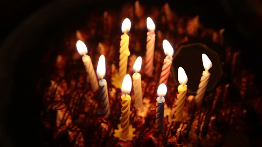 Happy Birthday Cake With Burning Spiral Candles Which Are Then ...