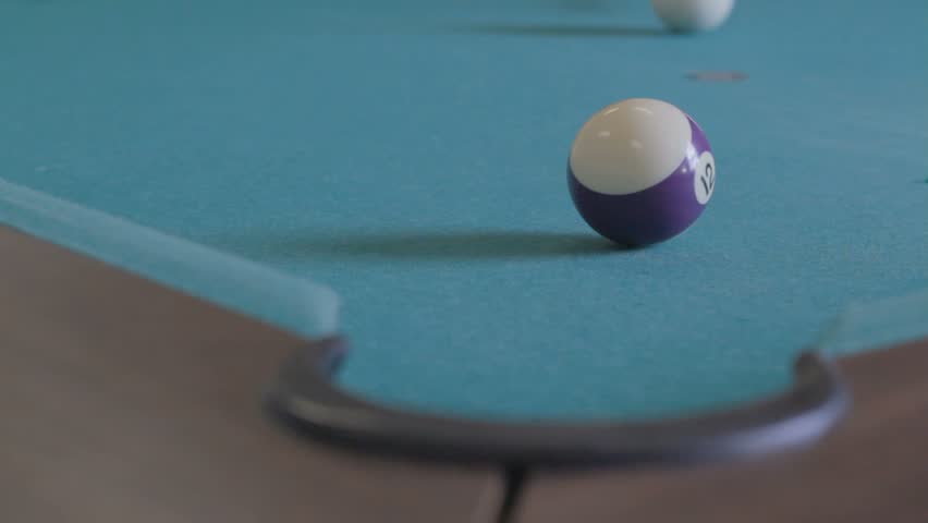 Striped Pool Ball Hit Into Pocket By Cue Ball Stock Footage Video ...