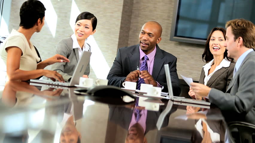 African American Business Executive In Meeting With His Multi Ethnic ...