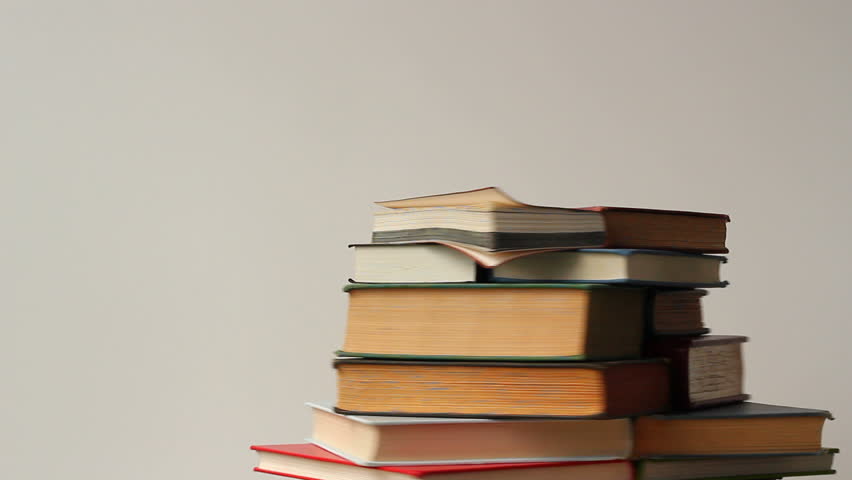 A Closeup View Of A Stack Of Books In Motion With Copy Space For Text ...