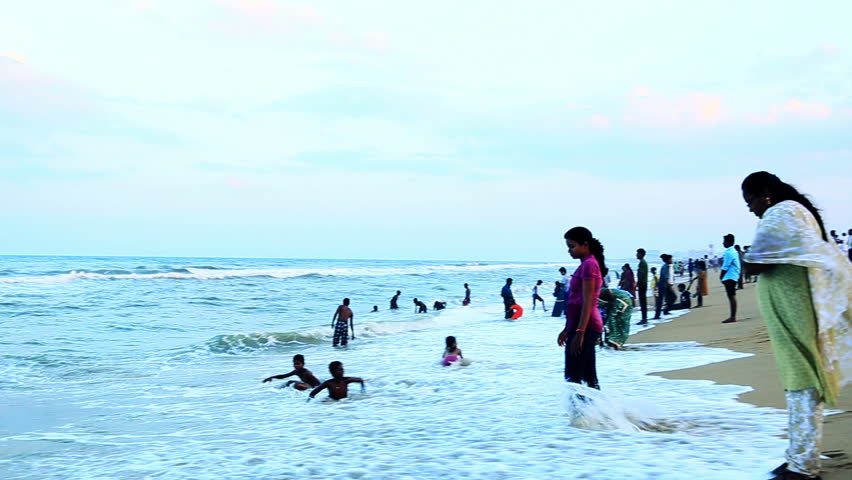 TAMIL NADU, INDIA - JUNE 2012: Pan Shot Of Tourists Enjoying On The ...