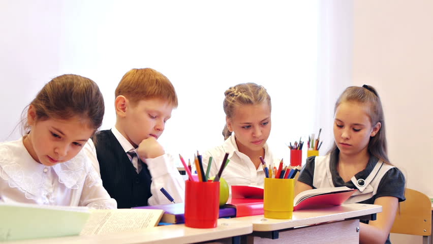 Attractive Young Pupils Studying In The Classroom Stock Footage Video ...