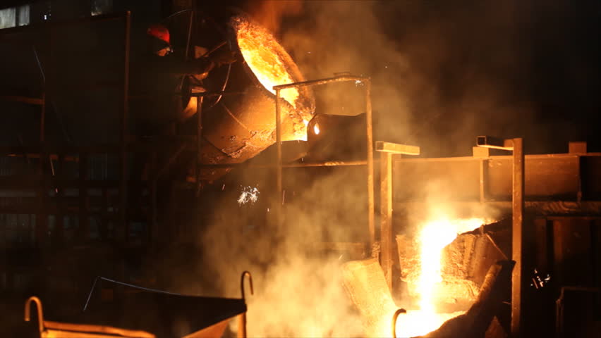 Hard Work In The Foundry, Liquid Metal In The Factory, Smelting Iron ...