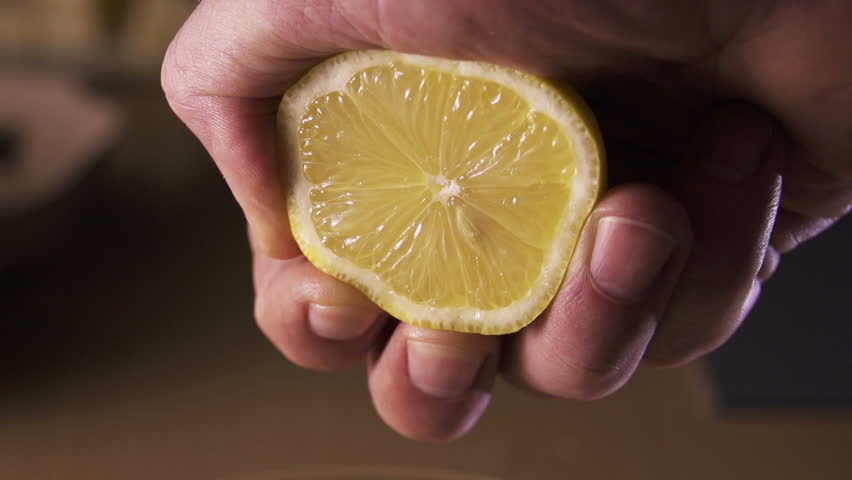 Hand Squeezing Lemon On Dark Background Stock Footage Video 3464789 ...