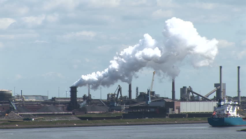 The Industrial Port Of Amsterdam-Chimneys, Smoke And Pollution Stock ...