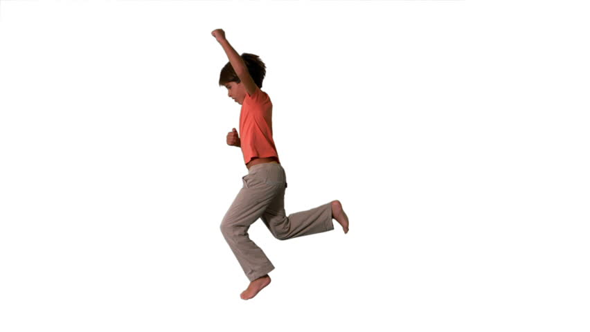 Side View Of Boy Jumping Up And Down On White Background In Slow Motion ...