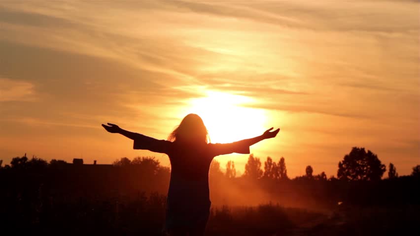 Silhouette Of A Girl Walking Into The Sunset Stock Footage Video ...