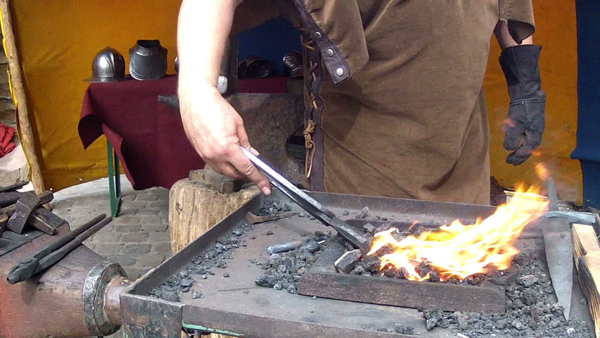 Blacksmith. Medieval Tradition Of Making Armor And Swords At The Forge ...