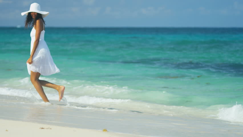 Beautiful Ethnic Girl In Bikini Splashing Waves On Beach Vacation Stock ...