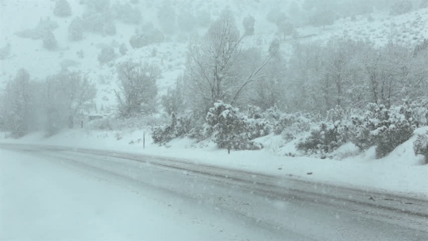 SANPETE, UTAH JAN 2013: Severe Winter Snow Storm Blizzard. White Car ...