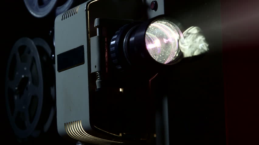 Old 16 Mm Flickering Movie Projector Showing Film Closeup Stock Footage ...