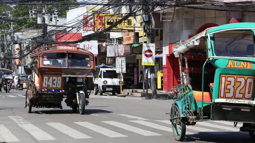 DUMAGUETE, PHILIPPINES - FEBRUARY 18, 2014 :Tricycle Motor Taxi ...