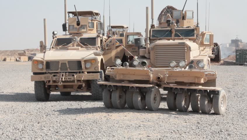 Afghanistan, Circa 2011: US Marine MRAPs With Minesweepers And Truck ...