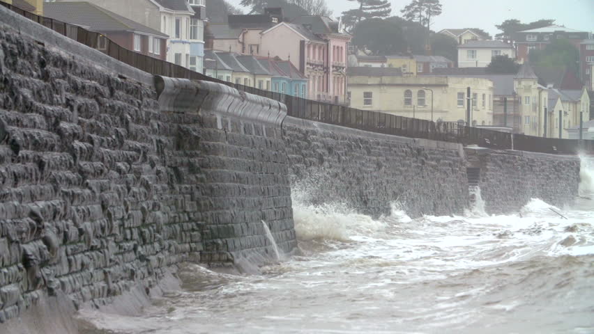 Large Waves Breaking Against Sea Wall At Dawlish In Devon Stock Footage ...